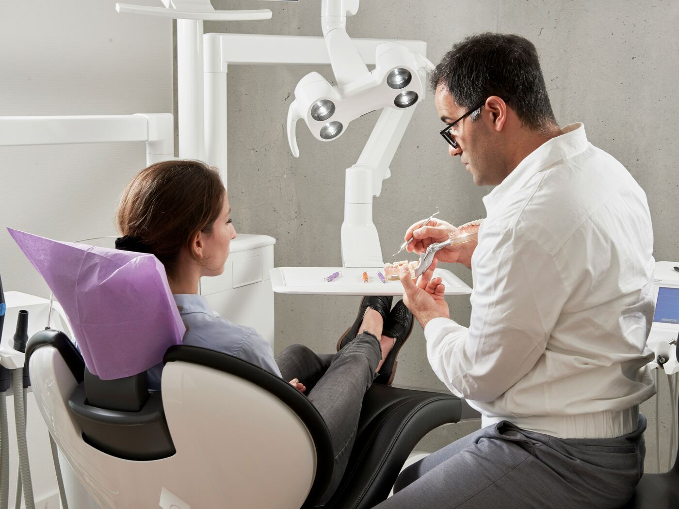 Dentist reviewing results with a patient